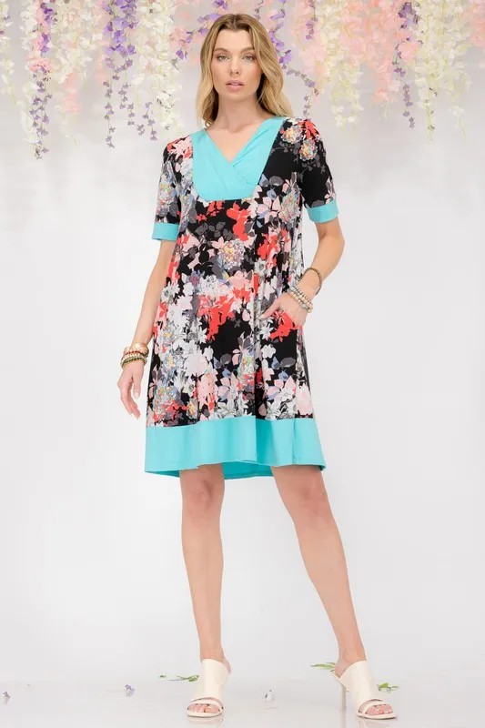 Full Size Floral Surplice Short Sleeve Dress with Pockets Plus Size - Aqua